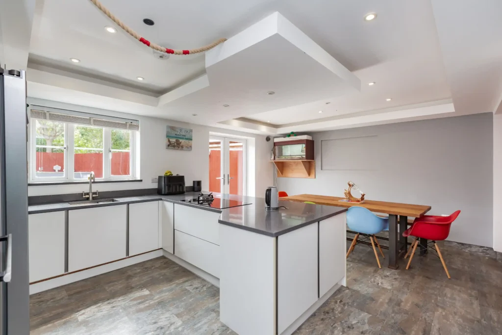 A £585k Whitstable home with a Ferrari parked in the kitchen stuns buyers, but the sleek V12 convertible isn’t included in the sale of this stylish four-bed property.
