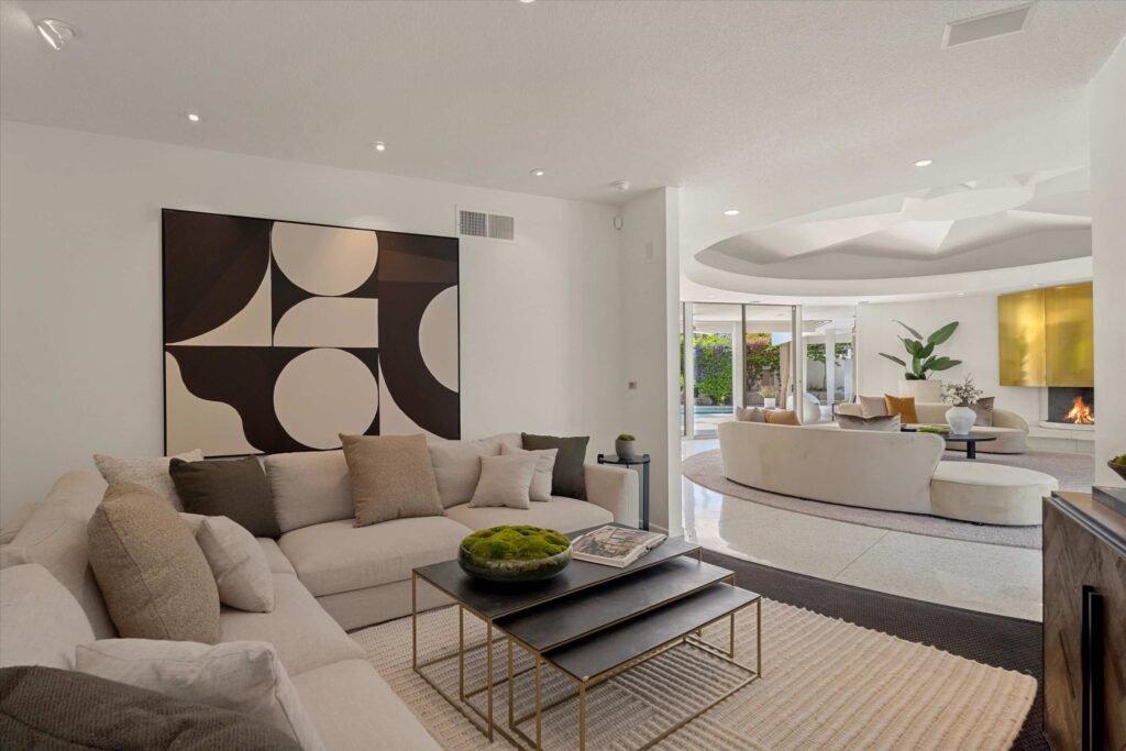 Loretta Young’s glamorous Palm Springs home, a mid-century modern masterpiece with curved walls, origami ceilings and a lush garden, is now listed for just under \$2.5 million.