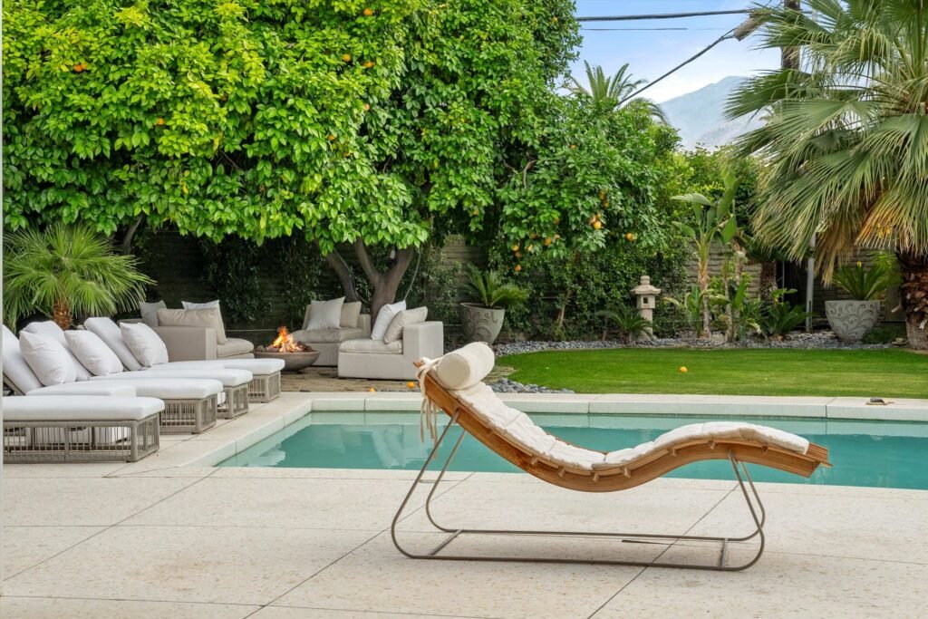 Loretta Young’s glamorous Palm Springs home, a mid-century modern masterpiece with curved walls, origami ceilings and a lush garden, is now listed for just under \$2.5 million.