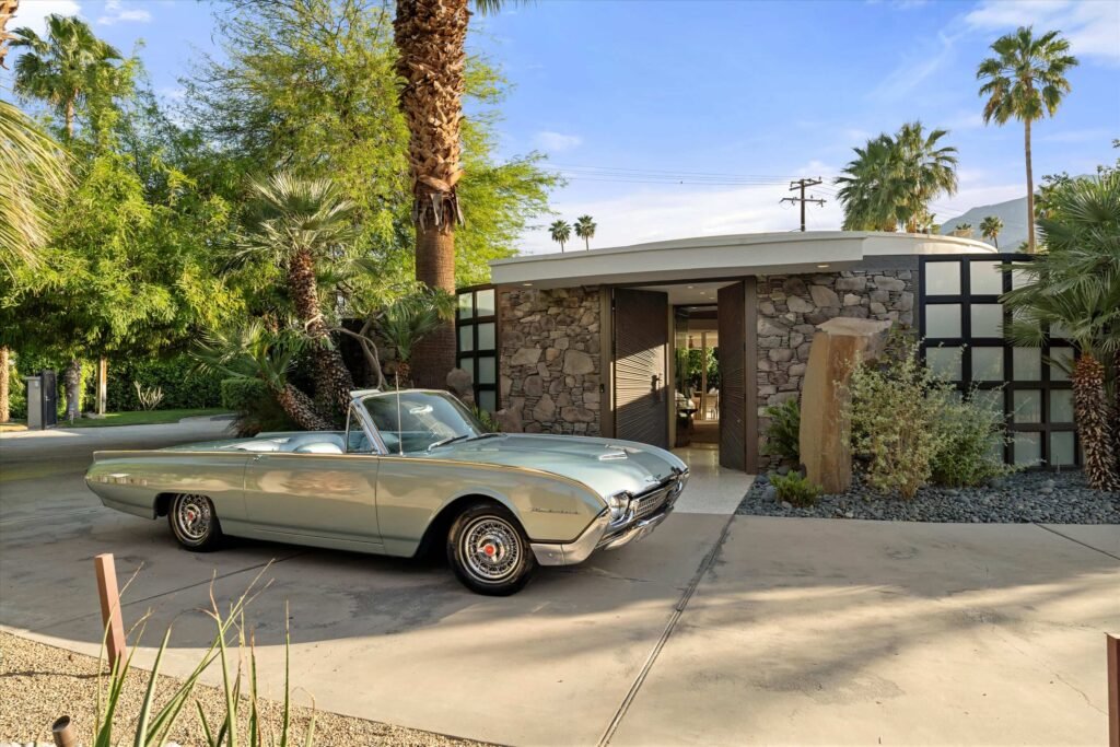 Loretta Young’s glamorous Palm Springs home, a mid-century modern masterpiece with curved walls, origami ceilings and a lush garden, is now listed for just under \$2.5 million.