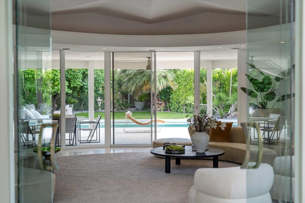Loretta Young’s glamorous Palm Springs home, a mid-century modern masterpiece with curved walls, origami ceilings and a lush garden, is now listed for just under \$2.5 million.