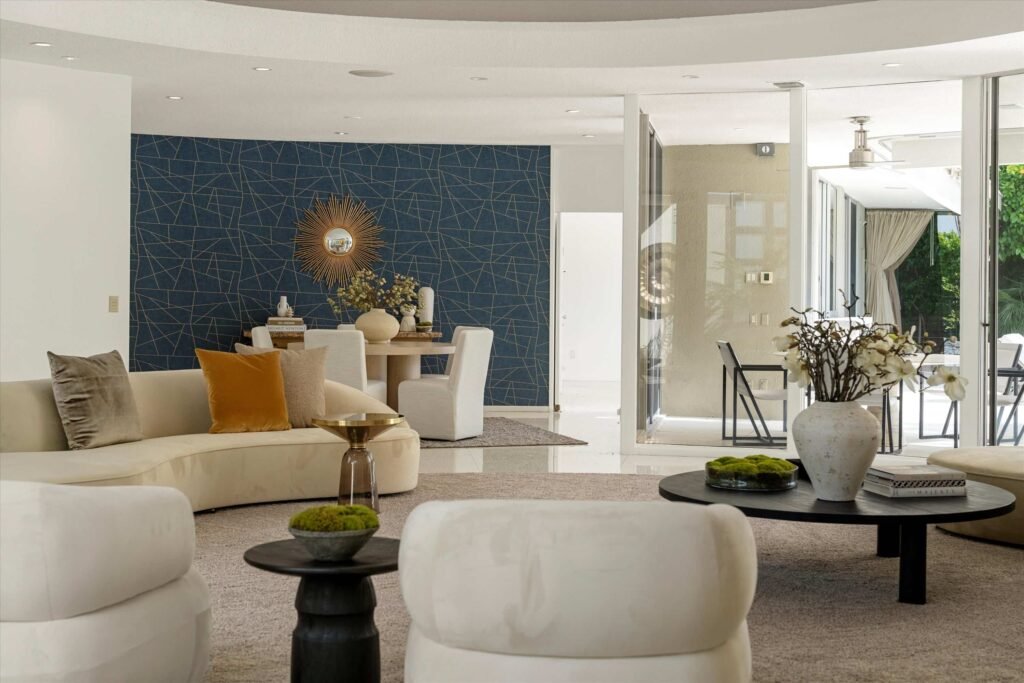 Loretta Young’s glamorous Palm Springs home, a mid-century modern masterpiece with curved walls, origami ceilings and a lush garden, is now listed for just under \$2.5 million.