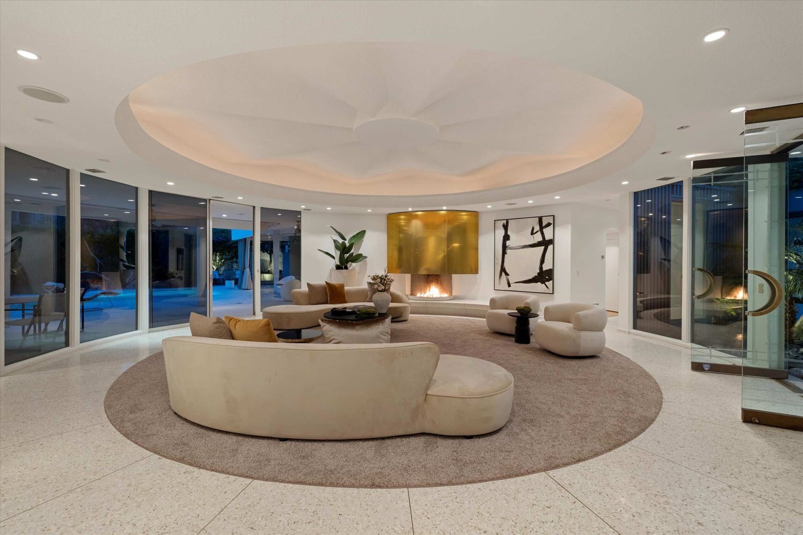 Loretta Young’s glamorous Palm Springs home, a mid-century modern masterpiece with curved walls, origami ceilings and a lush garden, is now listed for just under \$2.5 million.