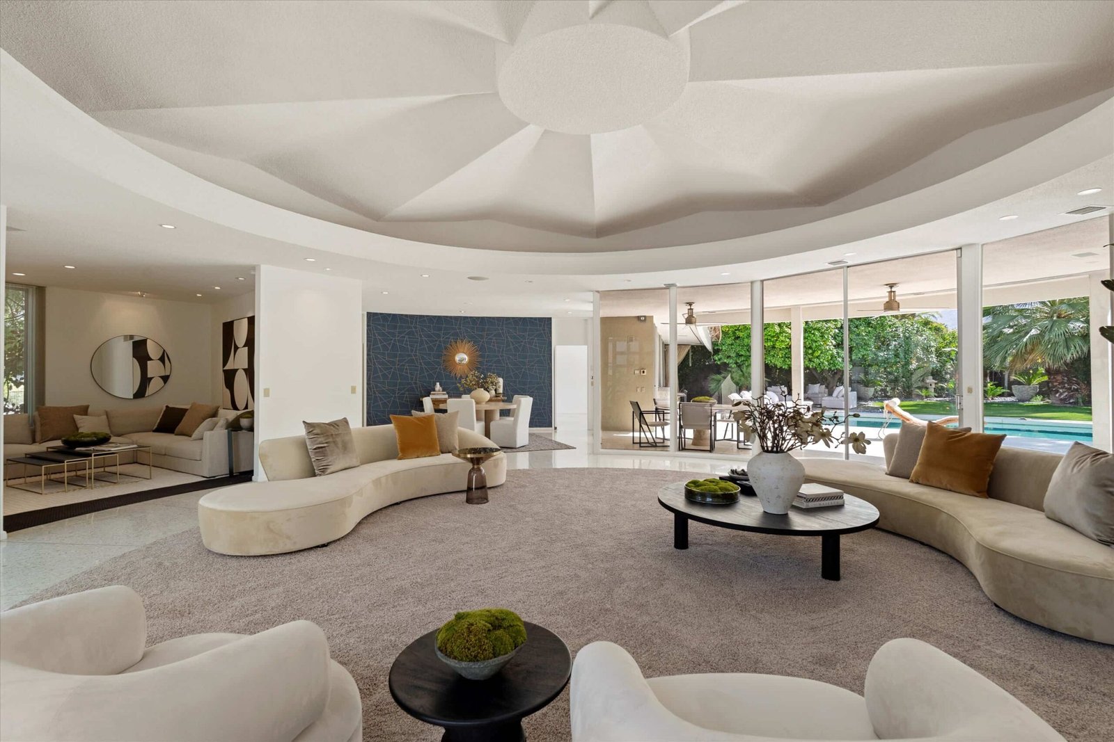 Loretta Young’s glamorous Palm Springs home, a mid-century modern masterpiece with curved walls, origami ceilings and a lush garden, is now listed for just under \$2.5 million.