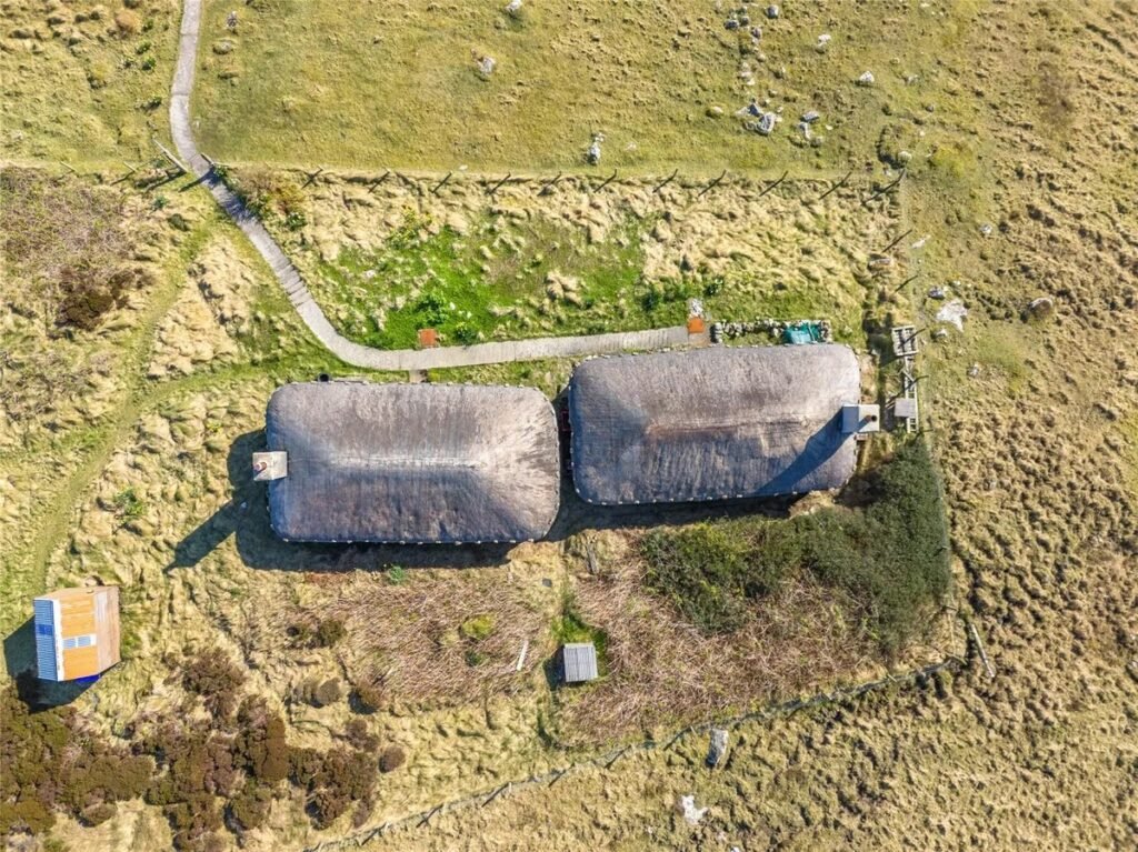 Twin thatched cottages on Scotland's Isle of Coll are for sale at £420,000, offering ocean views, shared gardens and rustic charm near where Kate Winslet owns a home.