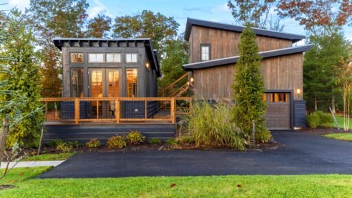 Tiny home in luxury Rhode Island community listed at \$850K offers golf, tennis, spa, fine dining and nature access with modern design, high-end finishes and full services.