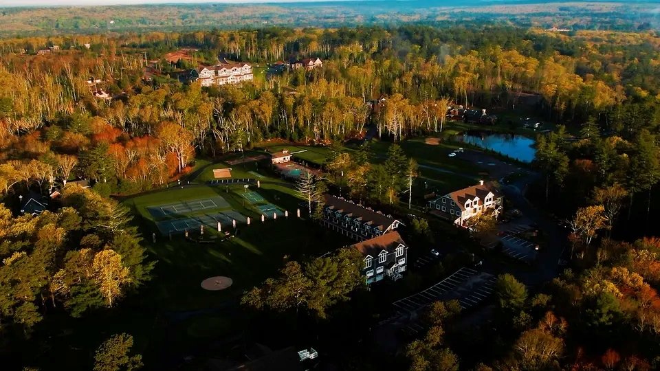 Tiny home in luxury Rhode Island community listed at \$850K offers golf, tennis, spa, fine dining and nature access with modern design, high-end finishes and full services.