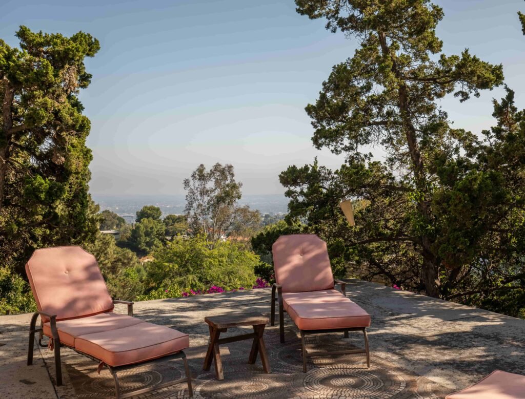 Hollywood Hills chalet with skyline views, recording studio, and jacuzzi hits market at £1.63m - once owned by artists, steps from the Hollywood Sign and Griffith Park.