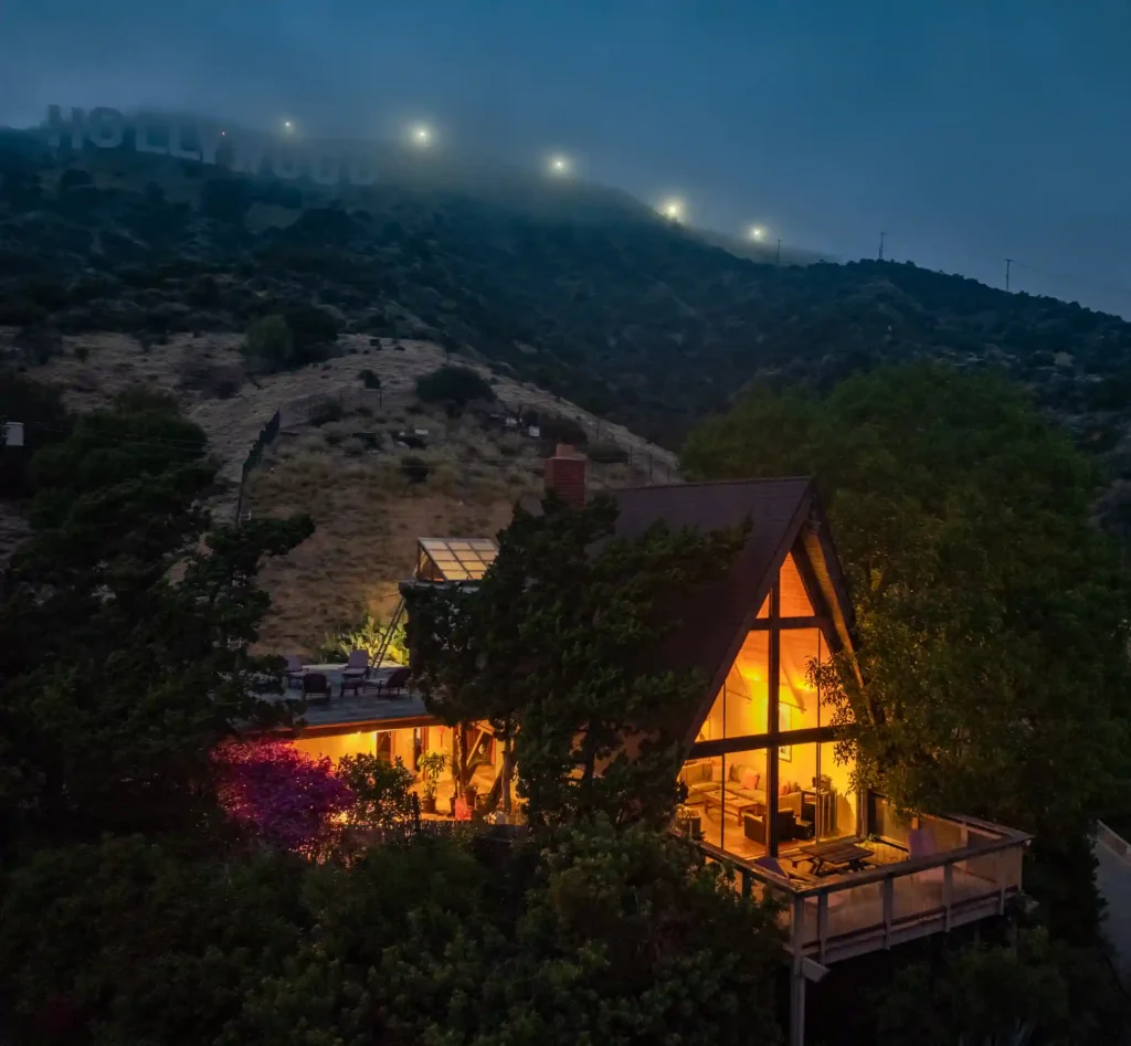 Hollywood Hills chalet with skyline views, recording studio, and jacuzzi hits market at £1.63m - once owned by artists, steps from the Hollywood Sign and Griffith Park.