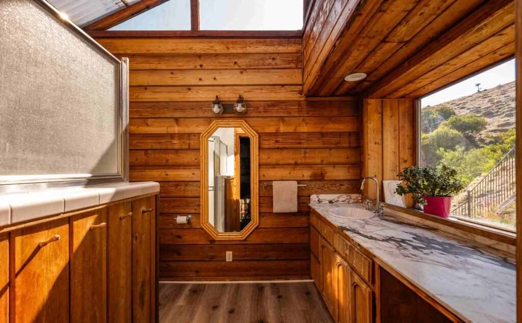 Hollywood Hills chalet with skyline views, recording studio, and jacuzzi hits market at £1.63m - once owned by artists, steps from the Hollywood Sign and Griffith Park.