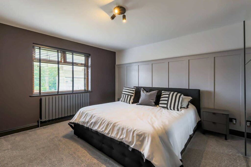 A five-bed Northern Ireland home with a full-size seven-a-side football pitch, gym, dog shower and luxe interiors is on sale for £435,000 offering fun and privacy.
