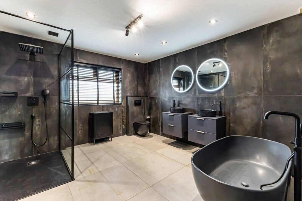A five-bed Northern Ireland home with a full-size seven-a-side football pitch, gym, dog shower and luxe interiors is on sale for £435,000 offering fun and privacy.
