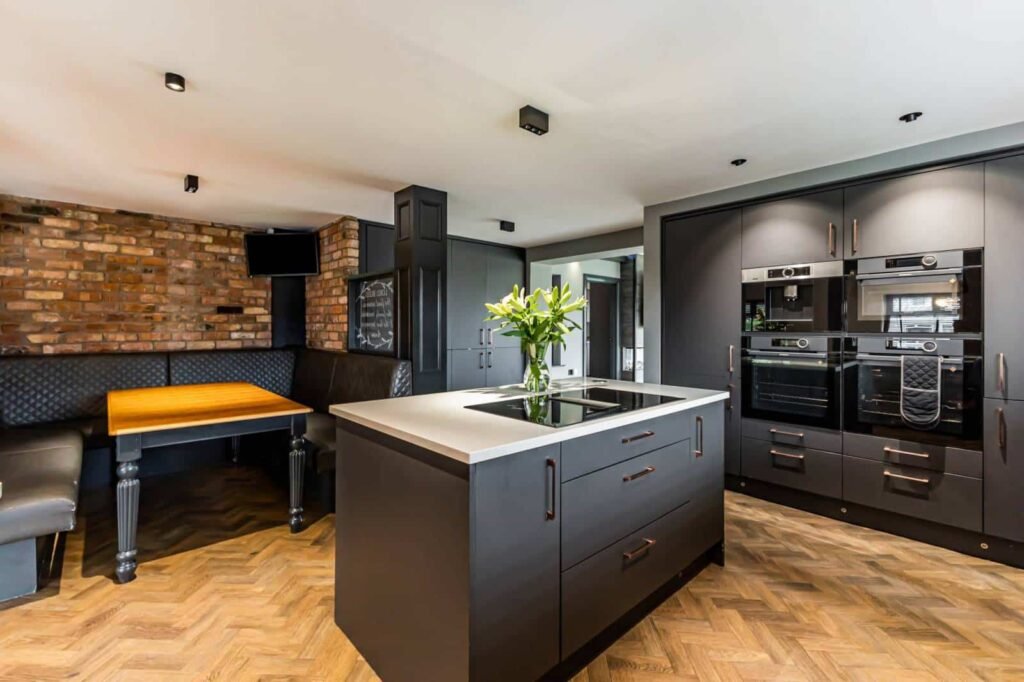 A five-bed Northern Ireland home with a full-size seven-a-side football pitch, gym, dog shower and luxe interiors is on sale for £435,000 offering fun and privacy.