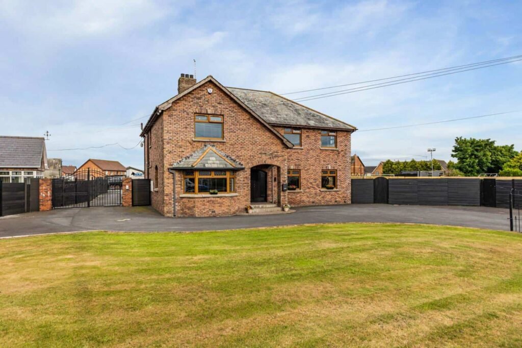 A five-bed Northern Ireland home with a full-size seven-a-side football pitch, gym, dog shower and luxe interiors is on sale for £435,000 offering fun and privacy.