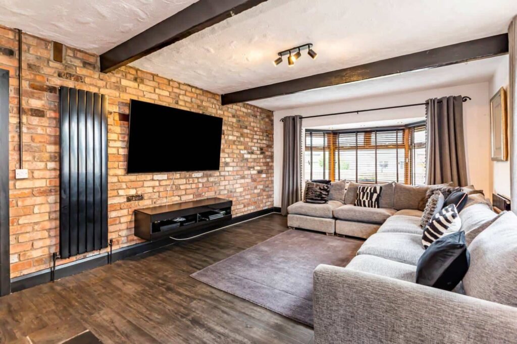 A five-bed Northern Ireland home with a full-size seven-a-side football pitch, gym, dog shower and luxe interiors is on sale for £435,000 offering fun and privacy.