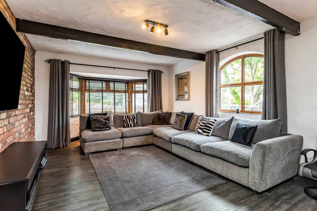 A five-bed Northern Ireland home with a full-size seven-a-side football pitch, gym, dog shower and luxe interiors is on sale for £435,000 offering fun and privacy.