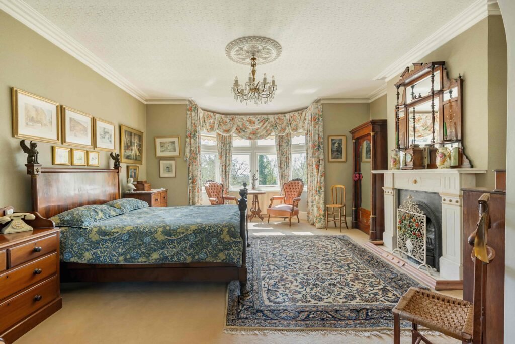 Stanley Kubrick’s former Elstree mansion with a pool, lush gardens, and film history is for sale at £6.95m, just in time for London’s sizzling summer heatwave.