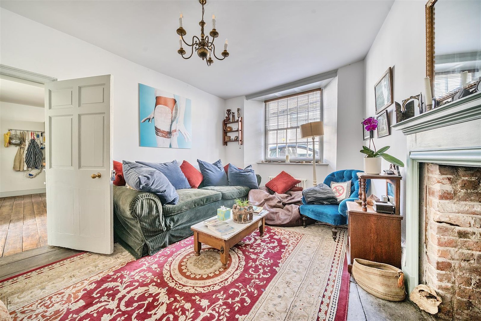 A Georgian townhouse in Devon with a secret tunnel, wine store, and historic well is on the market for £475,000, offering charm, character, and a touch of mystery.