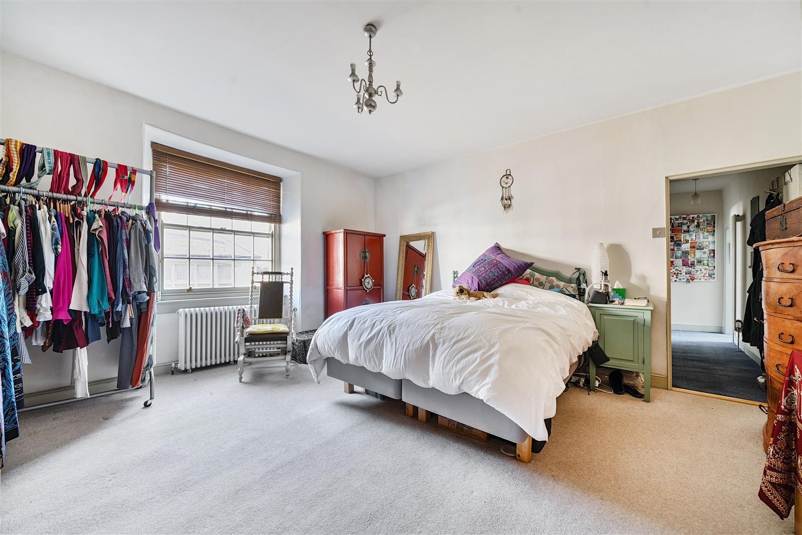 A Georgian townhouse in Devon with a secret tunnel, wine store, and historic well is on the market for £475,000, offering charm, character, and a touch of mystery.