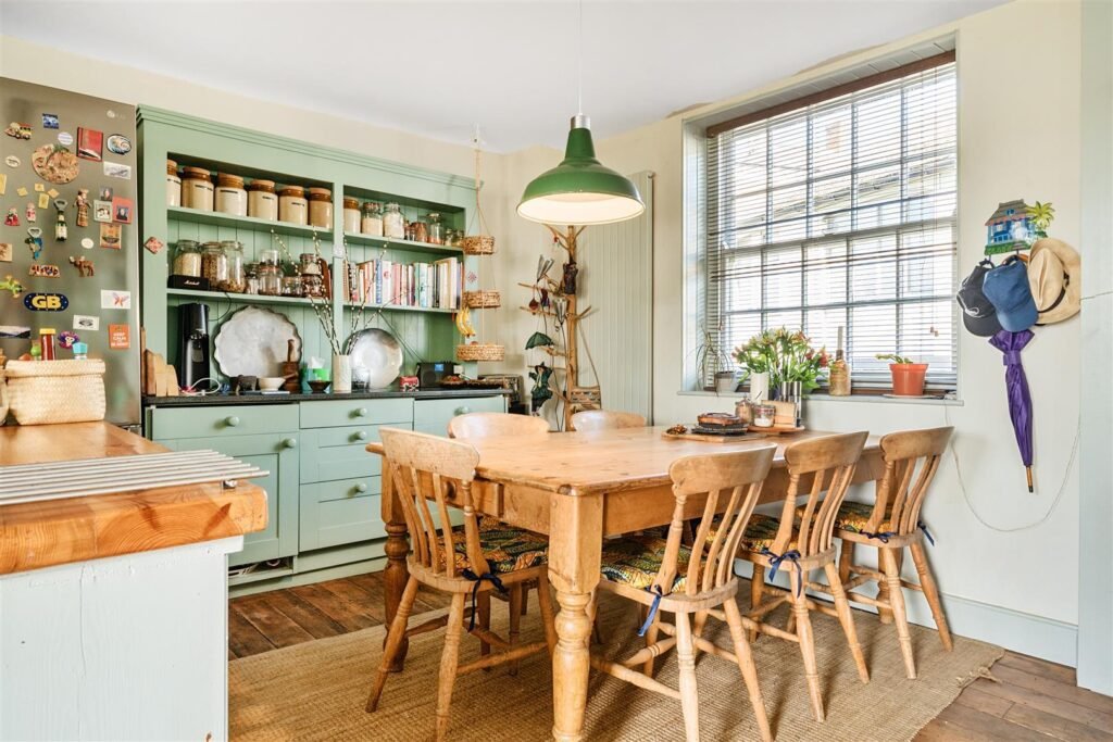 A Georgian townhouse in Devon with a secret tunnel, wine store, and historic well is on the market for £475,000, offering charm, character, and a touch of mystery.