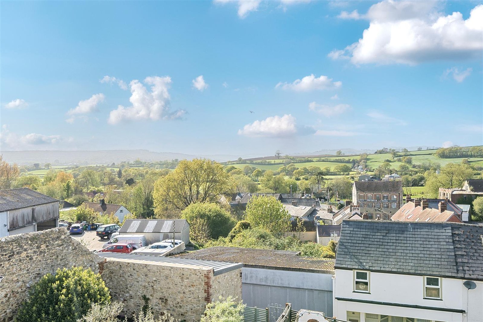 A Georgian townhouse in Devon with a secret tunnel, wine store, and historic well is on the market for £475,000, offering charm, character, and a touch of mystery.