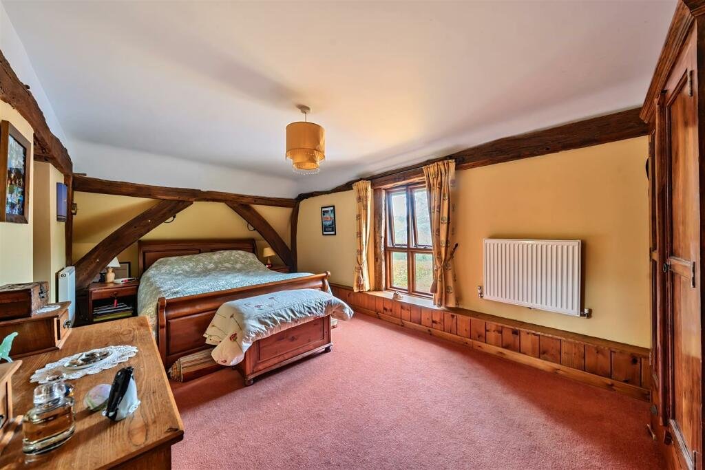 This £945k East Sussex barn home has 3 beds, a vineyard, 12.5 acres, stunning valley views and its own private airstrip and hangar for microlight aircraft.