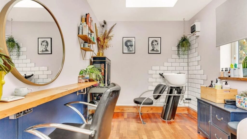 A Victorian semi in Bedford with three bedrooms, a stylish courtyard, and a fully equipped salon outbuilding is on sale for £450,000 offering charm and versatility.