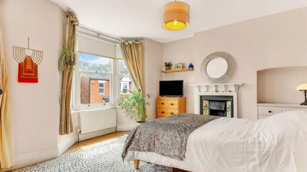 A Victorian semi in Bedford with three bedrooms, a stylish courtyard, and a fully equipped salon outbuilding is on sale for £450,000 offering charm and versatility.