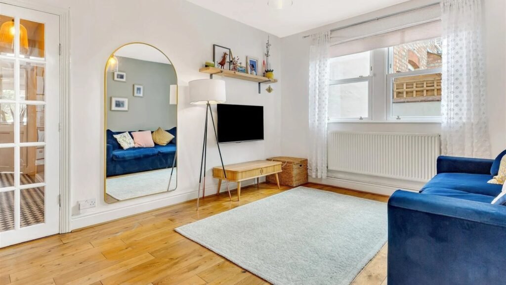 A Victorian semi in Bedford with three bedrooms, a stylish courtyard, and a fully equipped salon outbuilding is on sale for £450,000 offering charm and versatility.