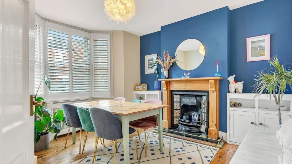 A Victorian semi in Bedford with three bedrooms, a stylish courtyard, and a fully equipped salon outbuilding is on sale for £450,000 offering charm and versatility.