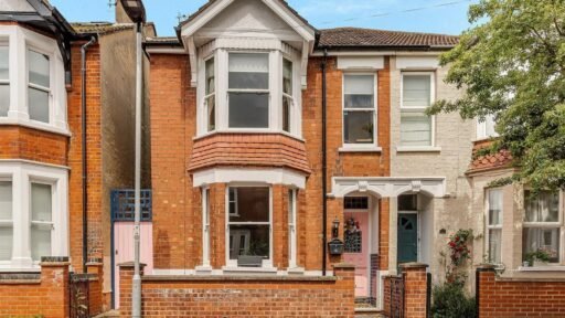 A Victorian semi in Bedford with three bedrooms, a stylish courtyard, and a fully equipped salon outbuilding is on sale for £450,000 offering charm and versatility.