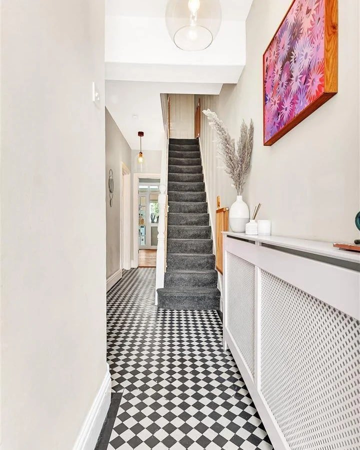 A Victorian semi in Bedford with three bedrooms, a stylish courtyard, and a fully equipped salon outbuilding is on sale for £450,000 offering charm and versatility.
