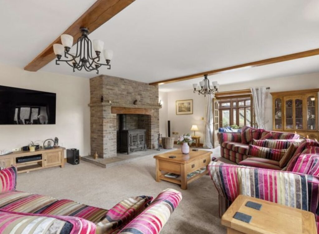 A £1.5m riverside home in Wales with a working water wheel, lush gardens, fishing rights and a two-bed annexe offers luxury countryside living on nearly 14 acres.