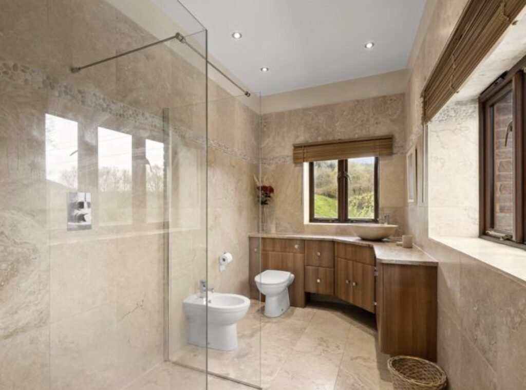 A £1.5m riverside home in Wales with a working water wheel, lush gardens, fishing rights and a two-bed annexe offers luxury countryside living on nearly 14 acres.