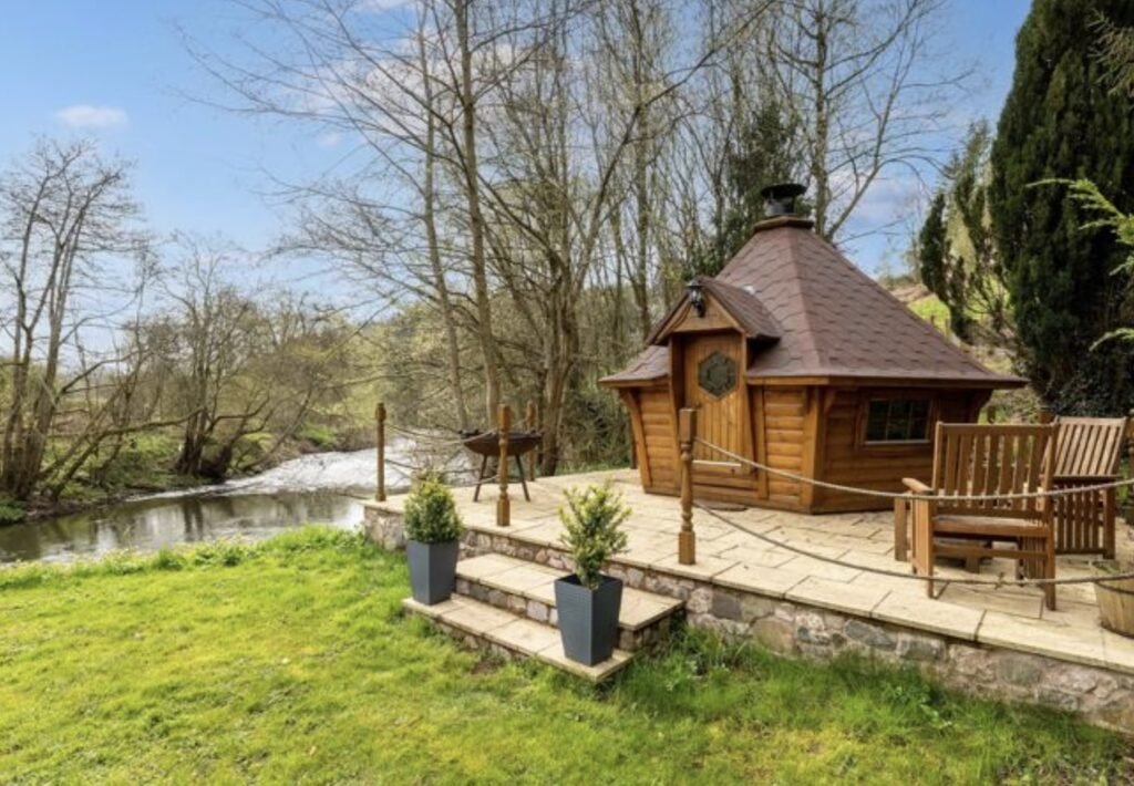 A £1.5m riverside home in Wales with a working water wheel, lush gardens, fishing rights and a two-bed annexe offers luxury countryside living on nearly 14 acres.