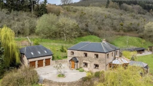 A £1.5m riverside home in Wales with a working water wheel, lush gardens, fishing rights and a two-bed annexe offers luxury countryside living on nearly 14 acres.