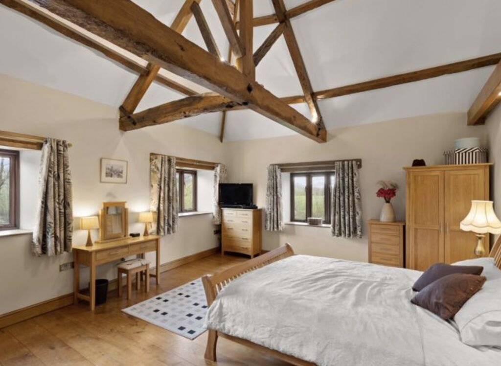 A £1.5m riverside home in Wales with a working water wheel, lush gardens, fishing rights and a two-bed annexe offers luxury countryside living on nearly 14 acres.