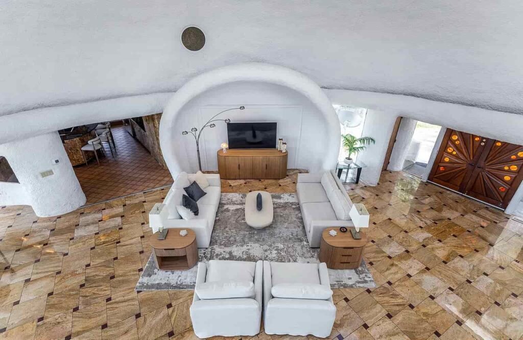 The £1.1m mushroom house in Connecticut offers 23.5 acres of woodland, lake views, a pool, and artistic architecture just a scenic drive from New York City.