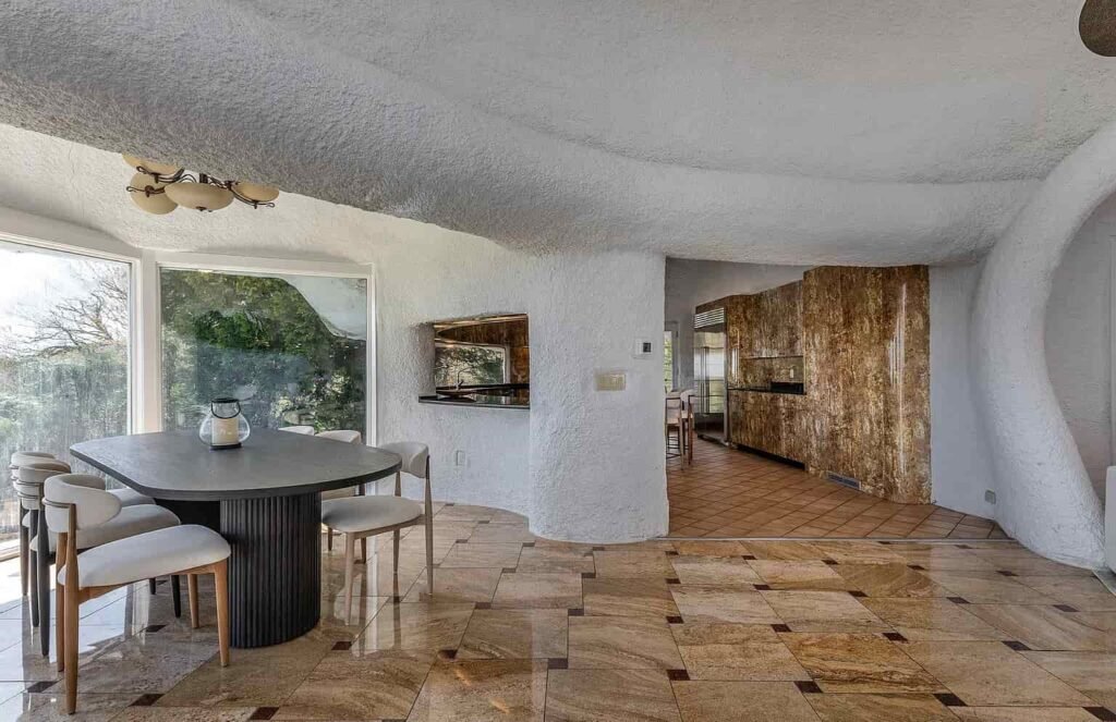 The £1.1m mushroom house in Connecticut offers 23.5 acres of woodland, lake views, a pool, and artistic architecture just a scenic drive from New York City.