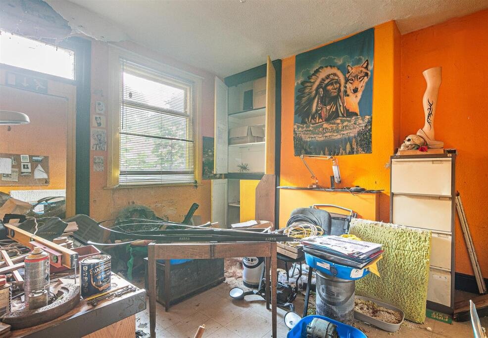 Snap up a three-bed Sheffield home with huge potential for just £130K. It’s packed with clutter and mold, but comes with a vintage retail unit and prime location.
