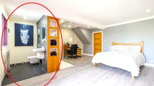 A Bradford home with a hot tub and summerhouse bar stuns online with its open plan ensuite - where even the toilet and shower are exposed inside the bedroom.