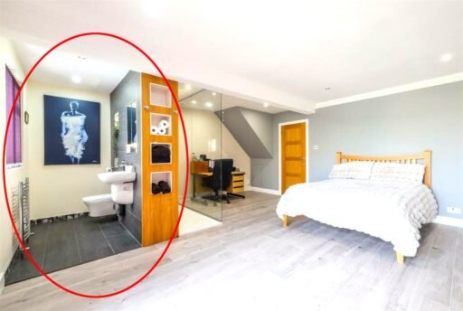 A Bradford home with a hot tub and summerhouse bar stuns online with its open plan ensuite - where even the toilet and shower are exposed inside the bedroom.