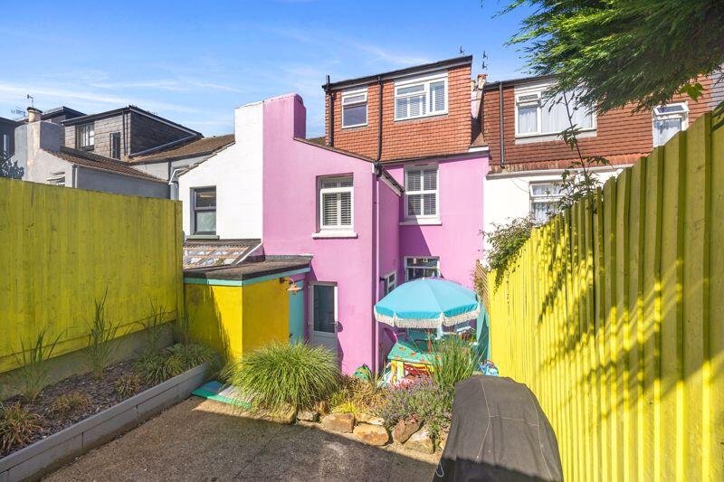 This £625,000 Brighton home stuns with rainbow colors, neon furniture, trinkets galore, and a Polly Pocket vibe that’s anything but boring on Bentham Road.
