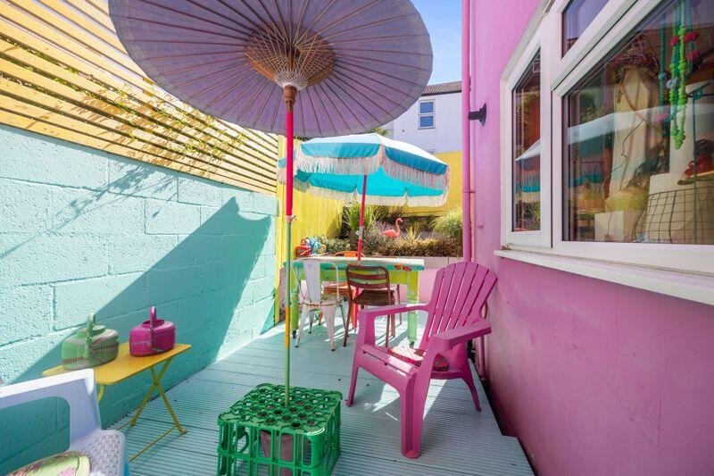 This £625,000 Brighton home stuns with rainbow colors, neon furniture, trinkets galore, and a Polly Pocket vibe that’s anything but boring on Bentham Road.