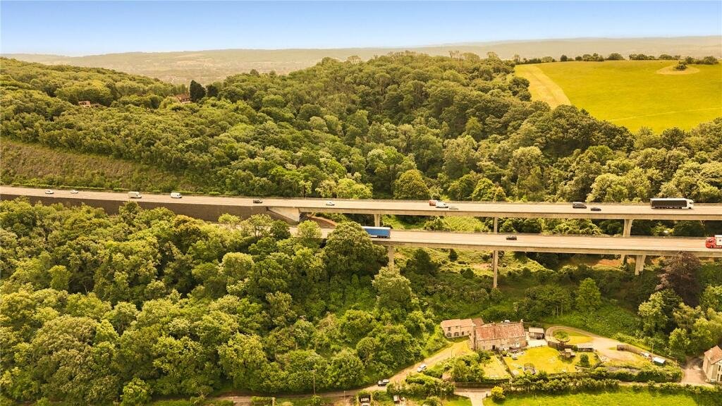 Beautiful countryside home in Clevedon hits the market for £475,000 but its unusual location directly under the M5 motorway is sparking debate and viral interest.