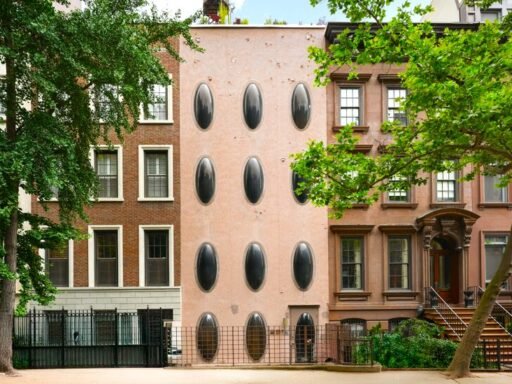 An iconic New York bubble house in Lenox Hill is on the market for \$5.75M, boasting curved glass windows, minimalist interiors, and a lush walled garden.