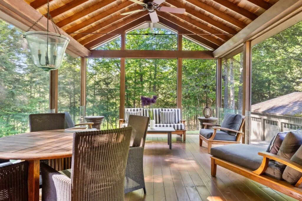 A \$3.25m Massachusetts estate features a quarry-carved pool with a 16ft waterfall, lush gardens, a canopy porch, and serene luxury across 3,459 sq ft of private grounds.