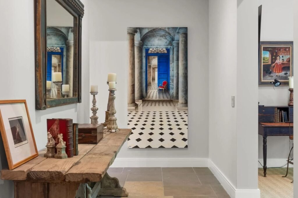 A \$3.25m Massachusetts estate features a quarry-carved pool with a 16ft waterfall, lush gardens, a canopy porch, and serene luxury across 3,459 sq ft of private grounds.