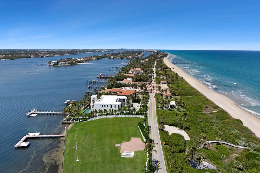 Custom-built mega mansion in Manalapan, FL hits market for \$85M with bowling alleys, a private beach tunnel, wine cellar, and ocean views from a 150-foot balcony.
