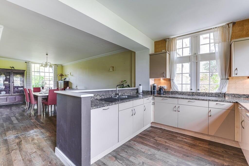 A Grade II listed Bedfordshire home where a tenant murdered his landlady is for sale at £550,000, blending period charm with a chilling past and striking modern design.